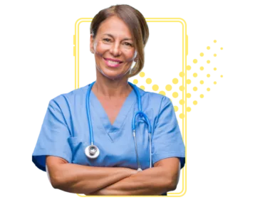 Woman doctor smiling and wearing scrubs and a stethoscope