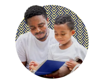 Man and child reading together